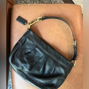 Coach handbag - soft black leather with purple silky interior. Great condition